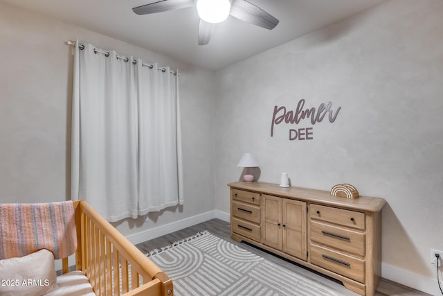 12211 W Hide Trl, Peoria, AZ 85383 - bedroom featuring wood finished floors and ceiling fan