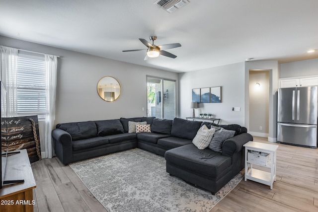 12211 W Hide Trl, Peoria, AZ 85383 - living area with a ceiling fan and light wood-type flooring
