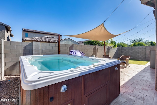 12211 W Hide Trl, Peoria, AZ 85383 - fenced backyard with a hot tub and a patio area