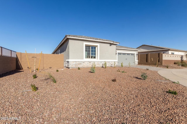 view of front of home featuring a garage