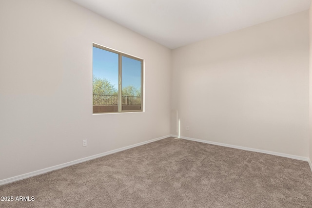 unfurnished room featuring carpet floors