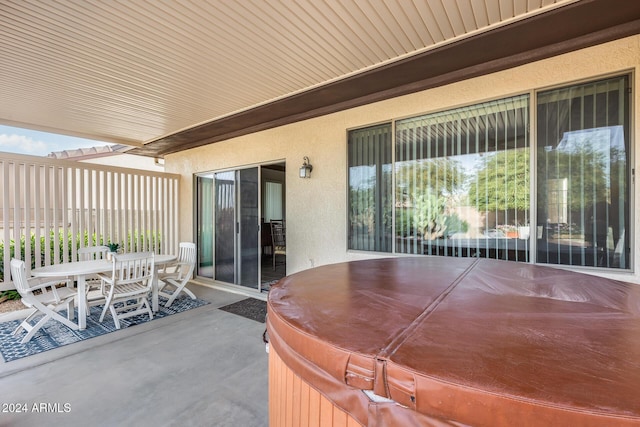 view of patio / terrace featuring a hot tub