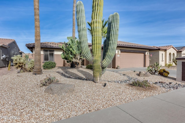 view of front of home with a garage