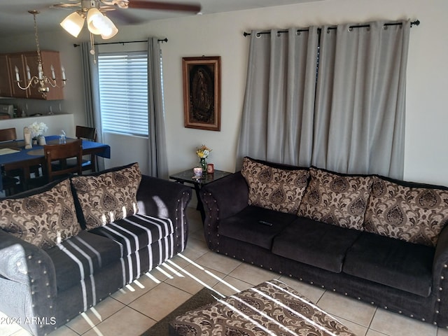 tiled living room featuring ceiling fan