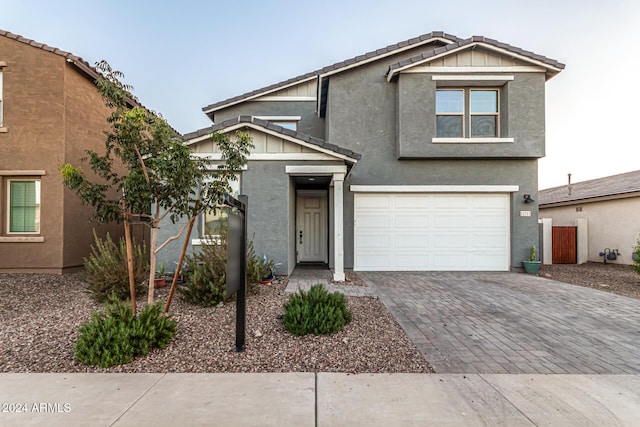 view of front of property with a garage