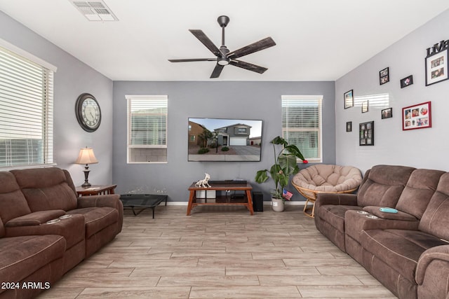 living room featuring ceiling fan