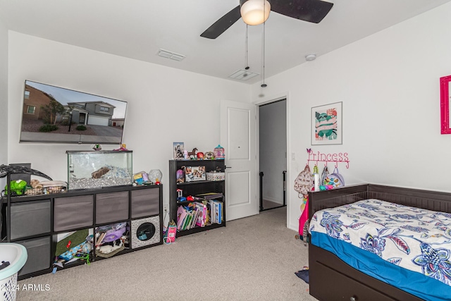 carpeted bedroom featuring ceiling fan