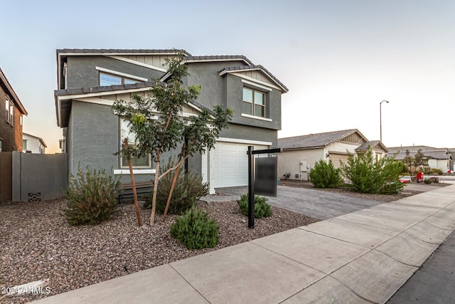 front of property featuring a garage