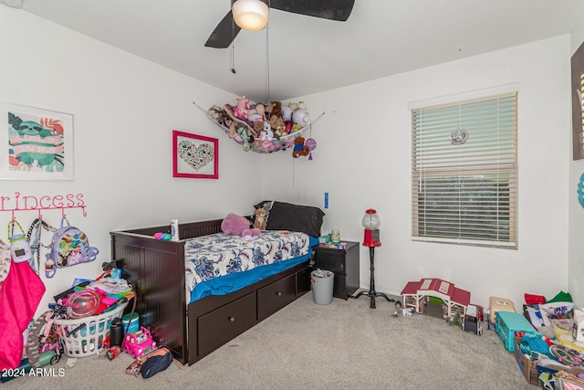 carpeted bedroom with ceiling fan