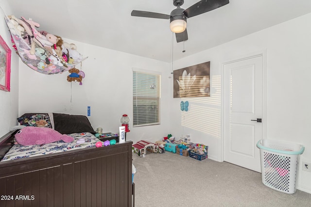 carpeted bedroom with ceiling fan