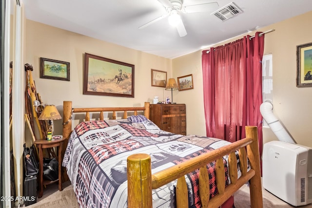 12426 W Surrey Ave, El Mirage, AZ 85335 - carpeted bedroom featuring visible vents and a ceiling fan