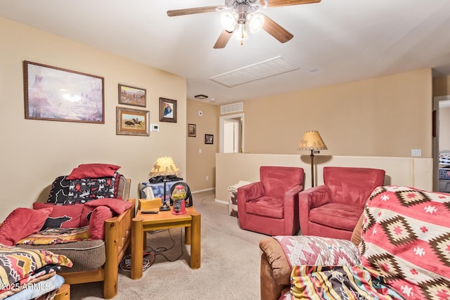 12426 W Surrey Ave, El Mirage, AZ 85335 - living room with attic access, visible vents, ceiling fan, and carpet