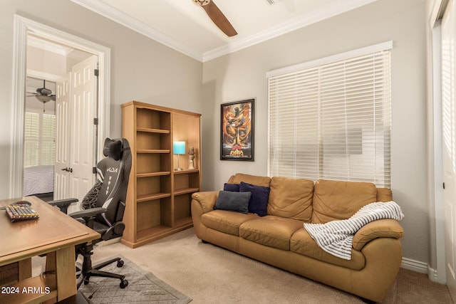 office featuring light carpet, crown molding, and ceiling fan