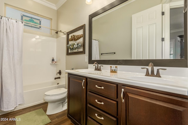 full bathroom featuring shower / bath combination with curtain, toilet, vanity, hardwood / wood-style flooring, and ornamental molding