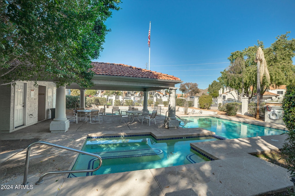 view of pool with a patio