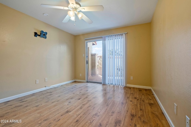 empty room featuring light hardwood / wood-style floors and ceiling fan