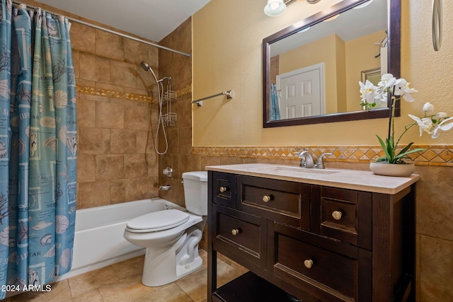 full bathroom featuring tile patterned floors, shower / bath combo with shower curtain, tile walls, and toilet