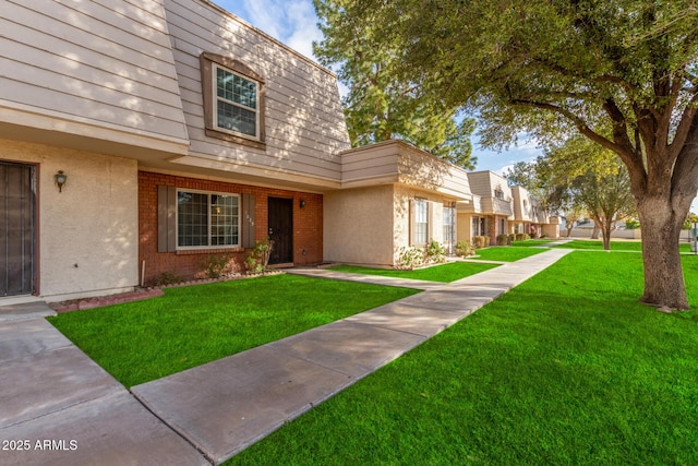 exterior space featuring a lawn