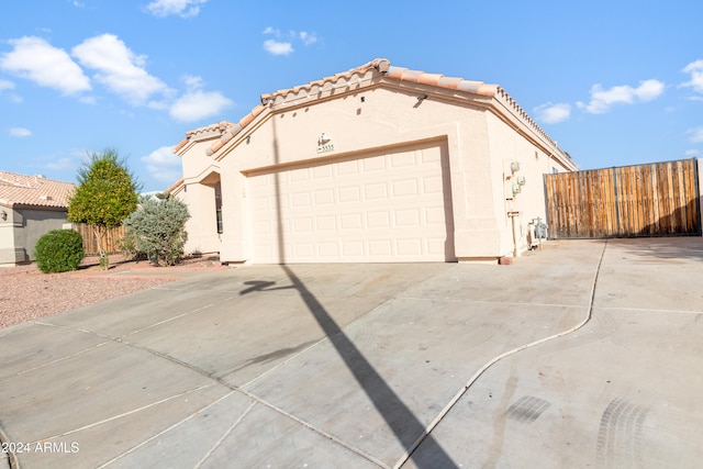 view of property exterior with a garage