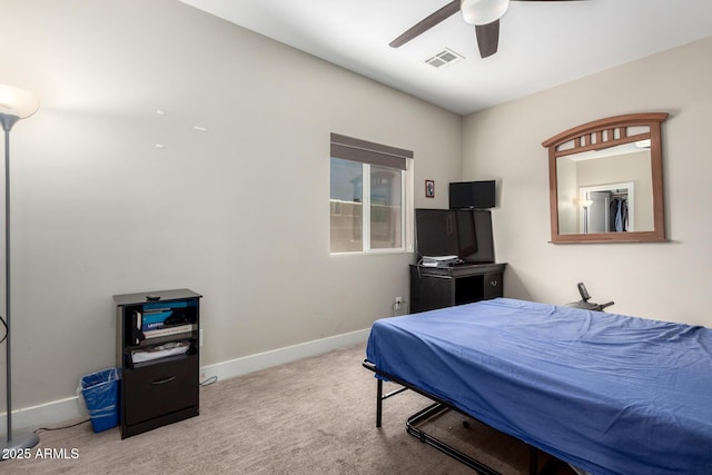 1005 E Weldon Ave, Phoenix, AZ 85014 - carpeted bedroom featuring baseboards and ceiling fan
