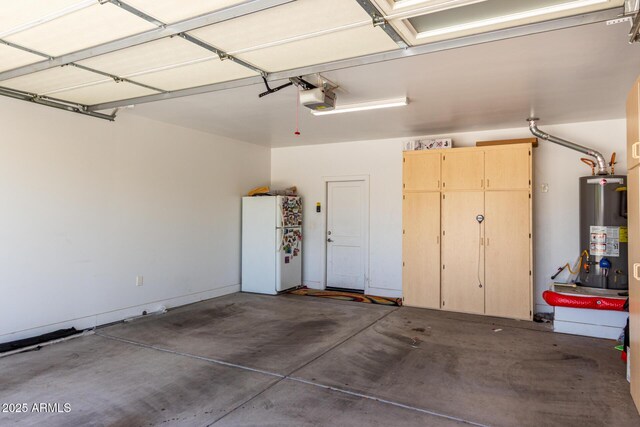 1005 E Weldon Ave, Phoenix, AZ 85014 - garage featuring gas water heater, freestanding refrigerator, and a garage door opener