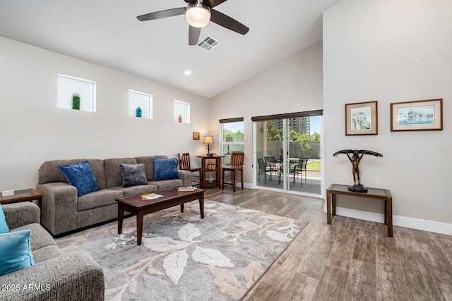 1005 E Weldon Ave, Phoenix, AZ 85014 - living area with high vaulted ceiling, a ceiling fan, wood finished floors, baseboards, and recessed lighting