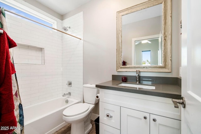 1005 E Weldon Ave, Phoenix, AZ 85014 - full bathroom with shower / bath combination with curtain, vanity, toilet, and wood finished floors