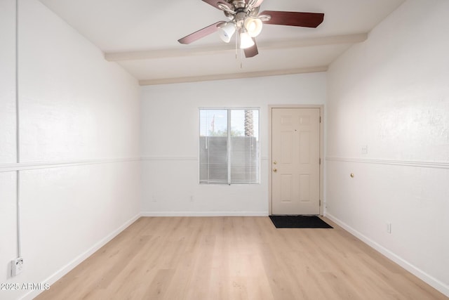 empty room featuring ceiling fan, beam ceiling, and light wood-type flooring