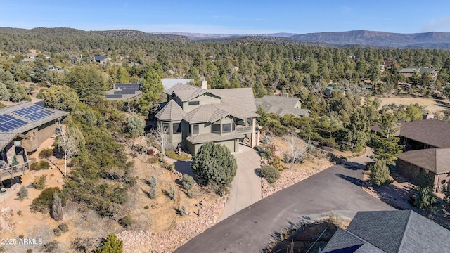 drone / aerial view featuring a mountain view