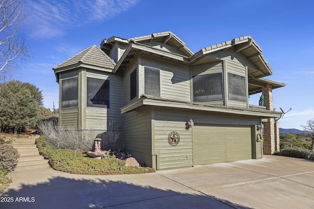 view of front of property with a garage