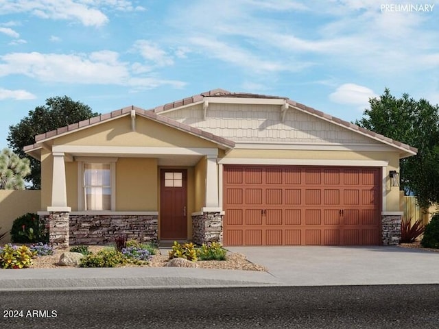 craftsman inspired home with a garage