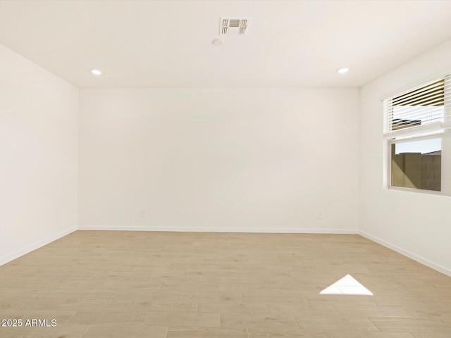 empty room featuring light hardwood / wood-style flooring