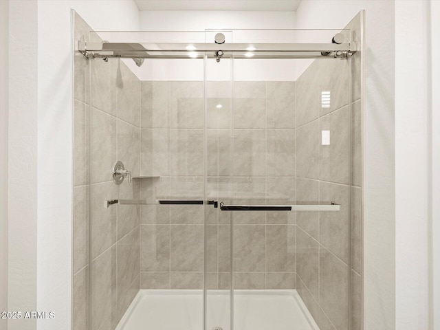 bathroom with an enclosed shower