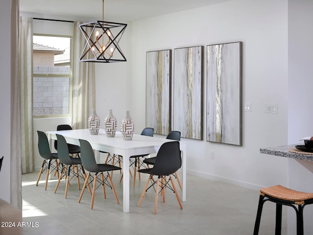 dining space featuring an inviting chandelier