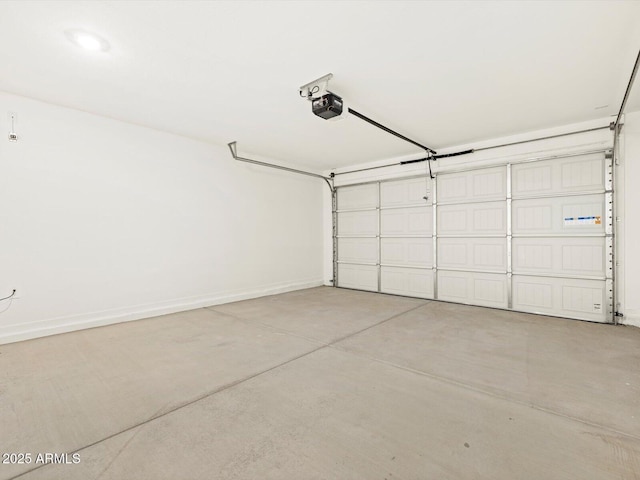 garage featuring a garage door opener