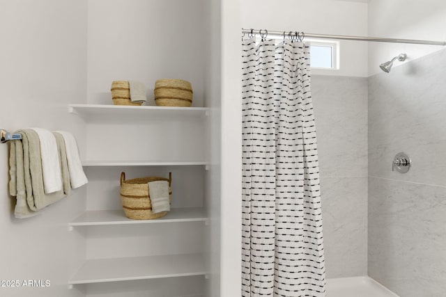 full bathroom featuring a tile shower