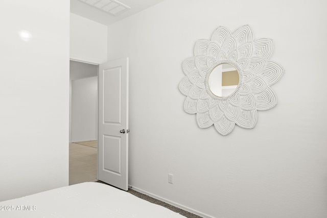 unfurnished bedroom featuring visible vents
