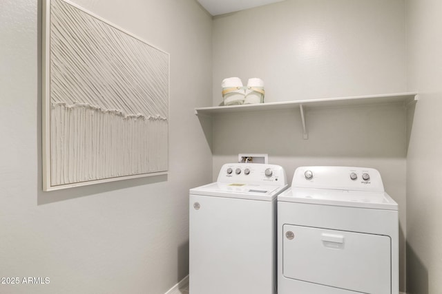 clothes washing area with laundry area and washer and dryer
