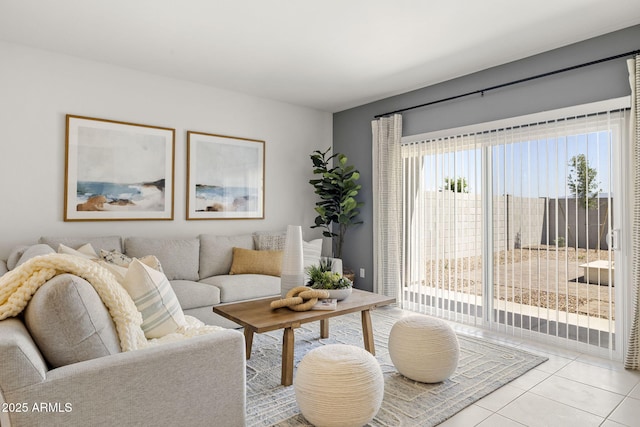 living area with tile patterned flooring