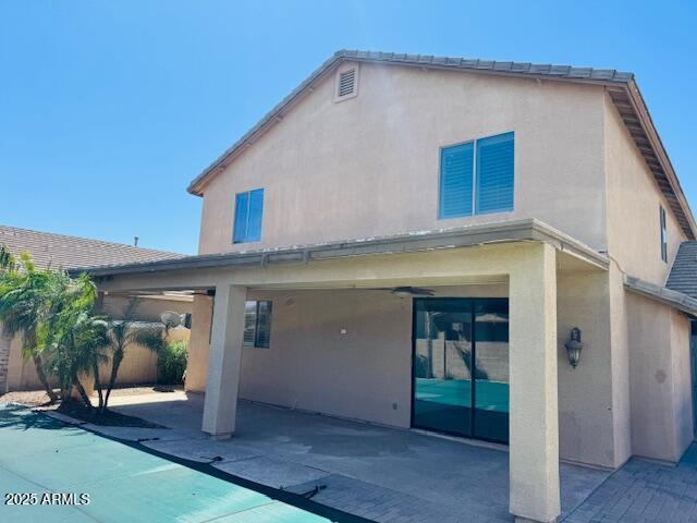 3502 W Belle Ave, San Tan Valley, AZ 85144 - back of house with a patio area, stucco siding, and fence