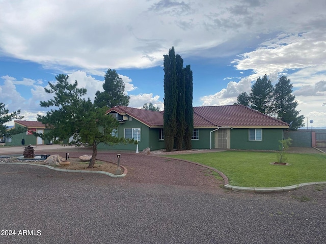 view of front of house with a front yard