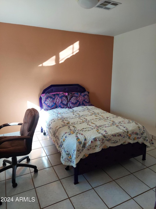 bedroom featuring tile patterned flooring