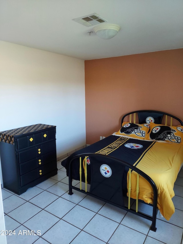 unfurnished bedroom featuring light tile patterned flooring