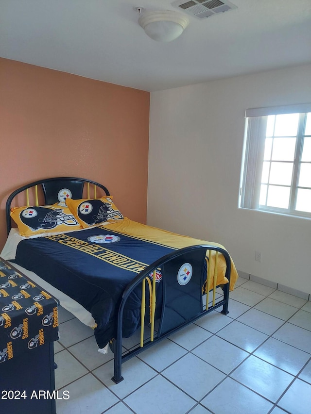 bedroom with tile patterned flooring