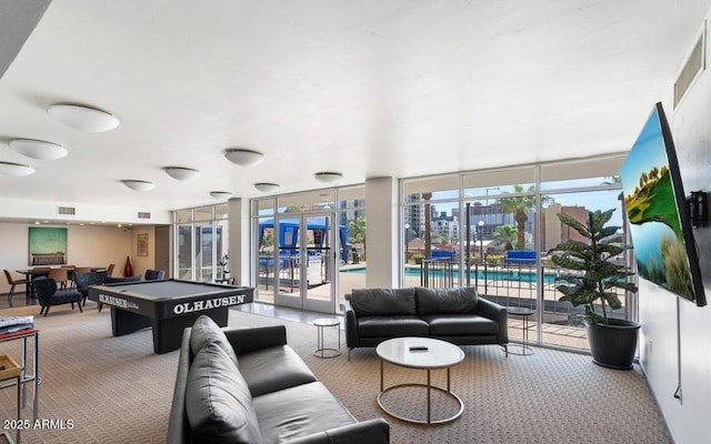 recreation room featuring expansive windows, pool table, carpet, and french doors