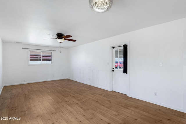 1215 E Geneva Dr, Tempe, AZ 85282 - spare room with wood finished floors and ceiling fan