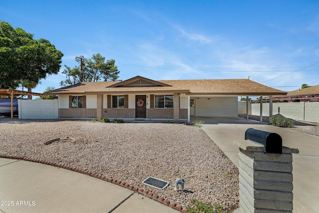 1215 E Geneva Dr, Tempe, AZ 85282 - single story home with driveway, a porch, a carport, and brick siding