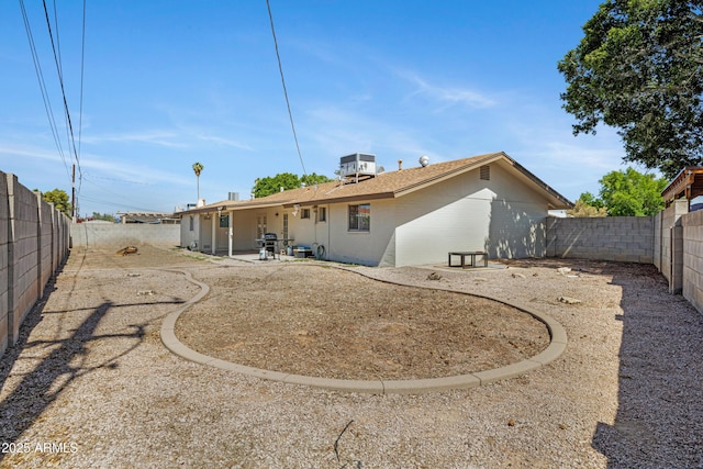1215 E Geneva Dr, Tempe, AZ 85282 - rear view of house with a fenced backyard, a patio area, and central air condition unit