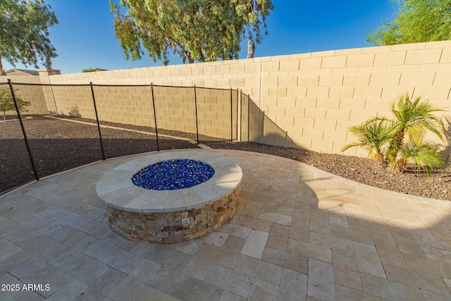 3532 W Mesquite Ave, San Tan Valley, AZ 85144 - fenced backyard featuring a patio area and a fire pit