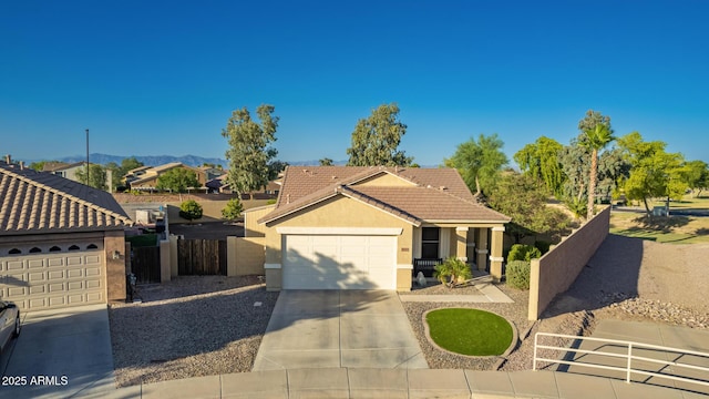3532 W Mesquite Ave, San Tan Valley, AZ 85144 - ranch-style home featuring a tile roof, stucco siding, concrete driveway, and a garage